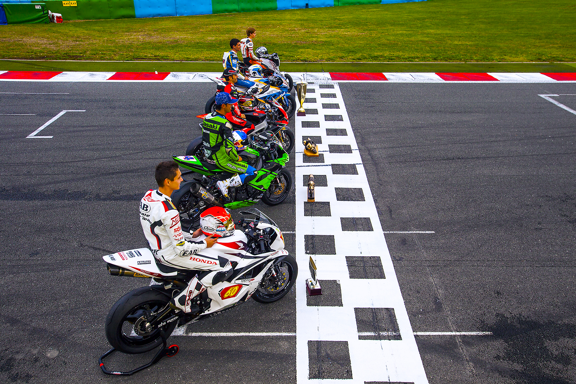 Photograph of all the world champions of the various categories of the World Championship Superbike